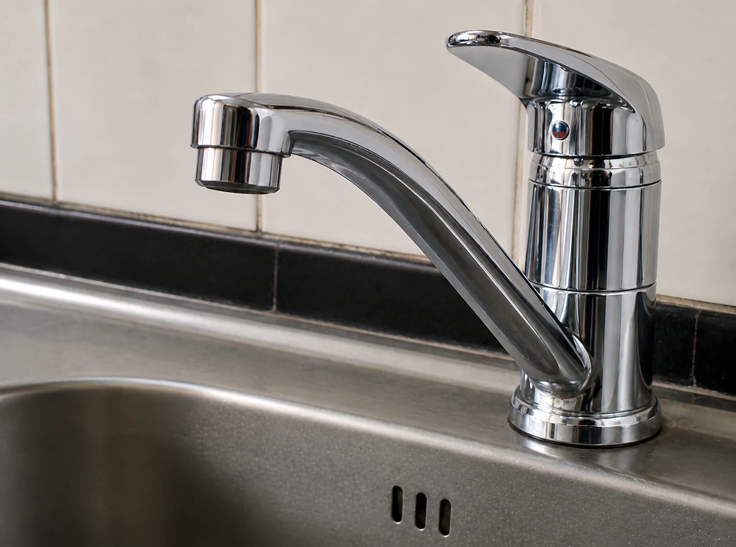 A repaired chrome faucet shown in a property update